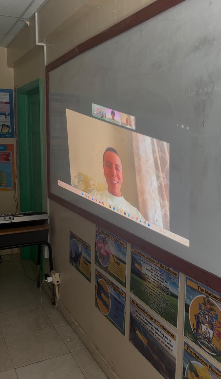 Guest speaker projected on screen during an educational guest session at Island Innovators Bahamas 2026